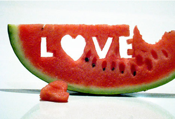 Watermelon with "Love" carved into it natural sunscreen