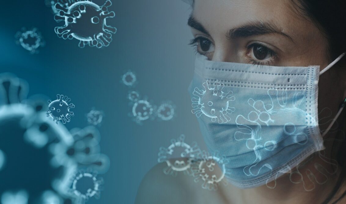 Graphic of woman wearing mask surrounded by atoms
